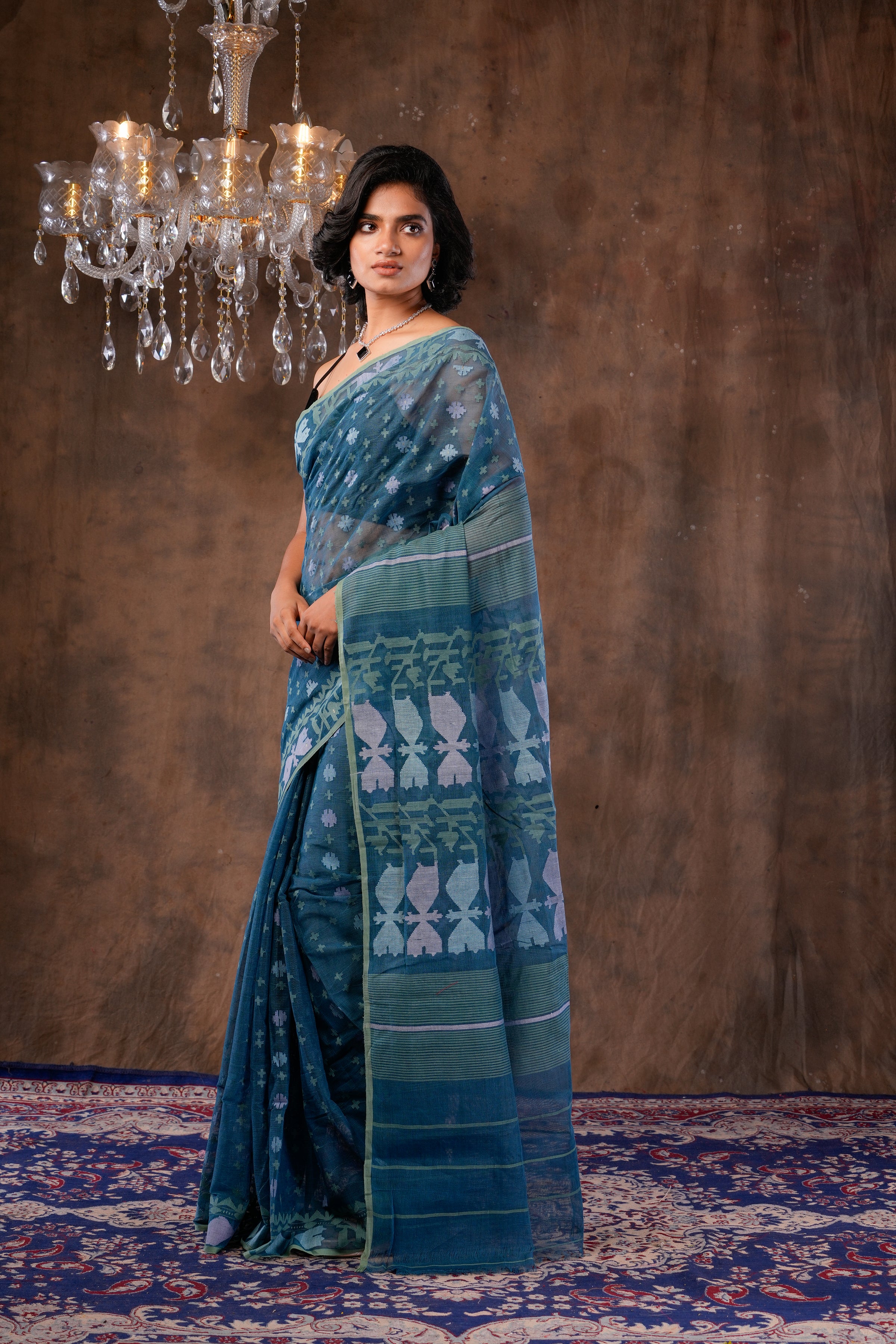 Handwoven deep green Dhakai jamdani Saree