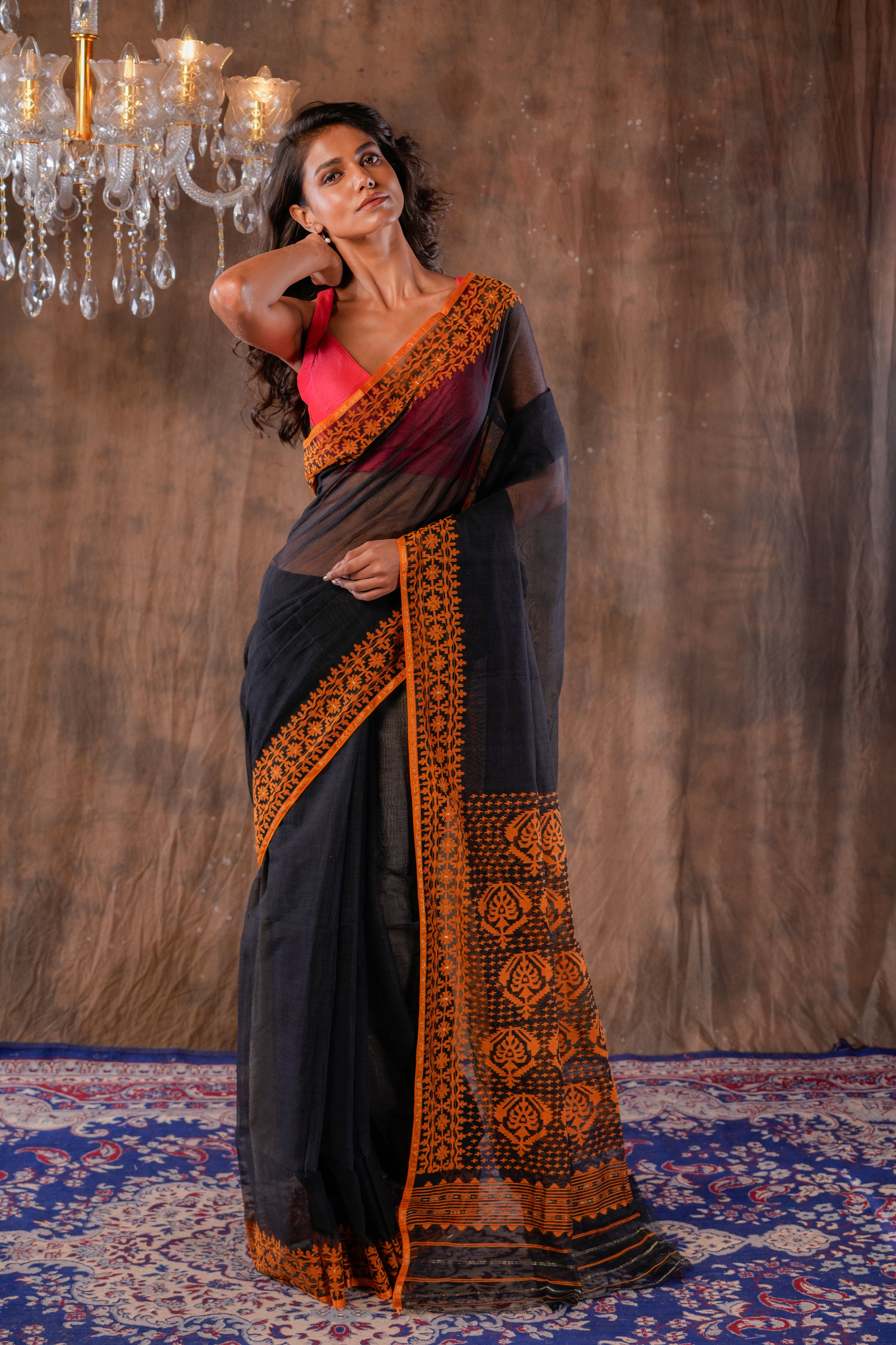 Handwoven Black Dhakai Jamdani With Orange Border Saree