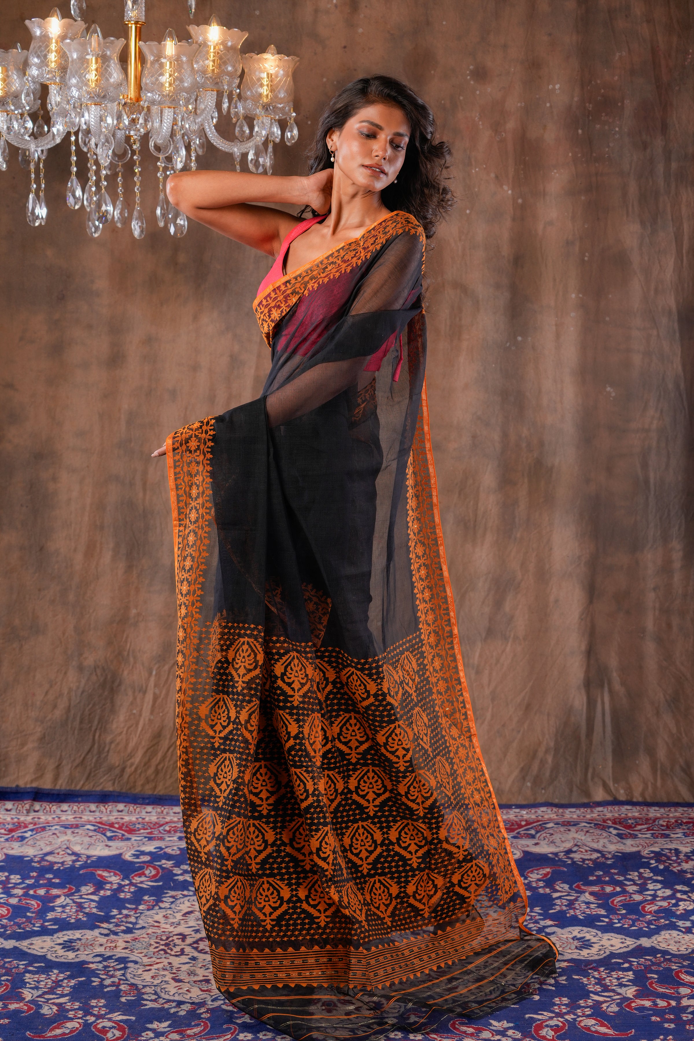 Handwoven Black Dhakai Jamdani With Orange Border Saree