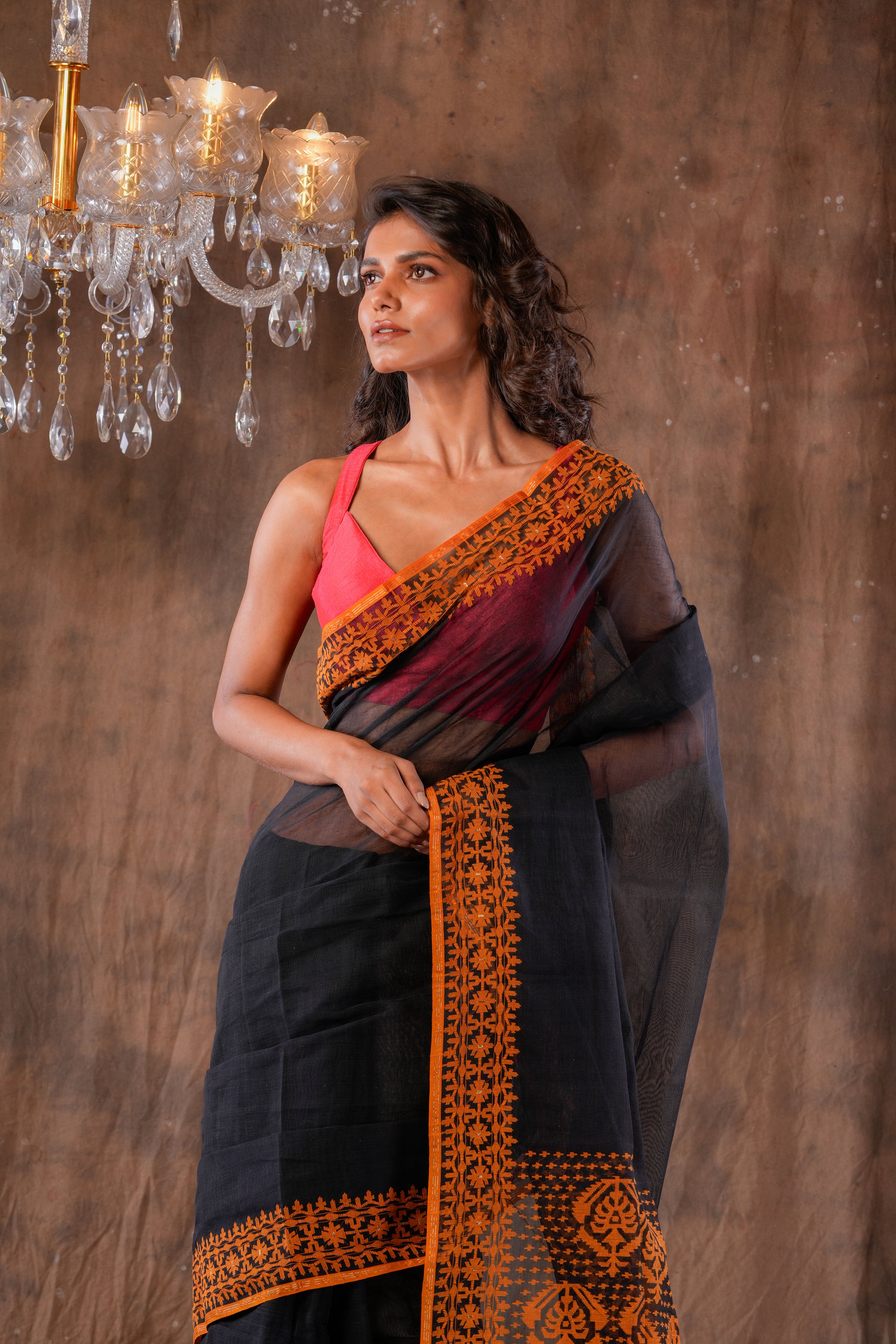 Handwoven Black Dhakai Jamdani With Orange Border Saree
