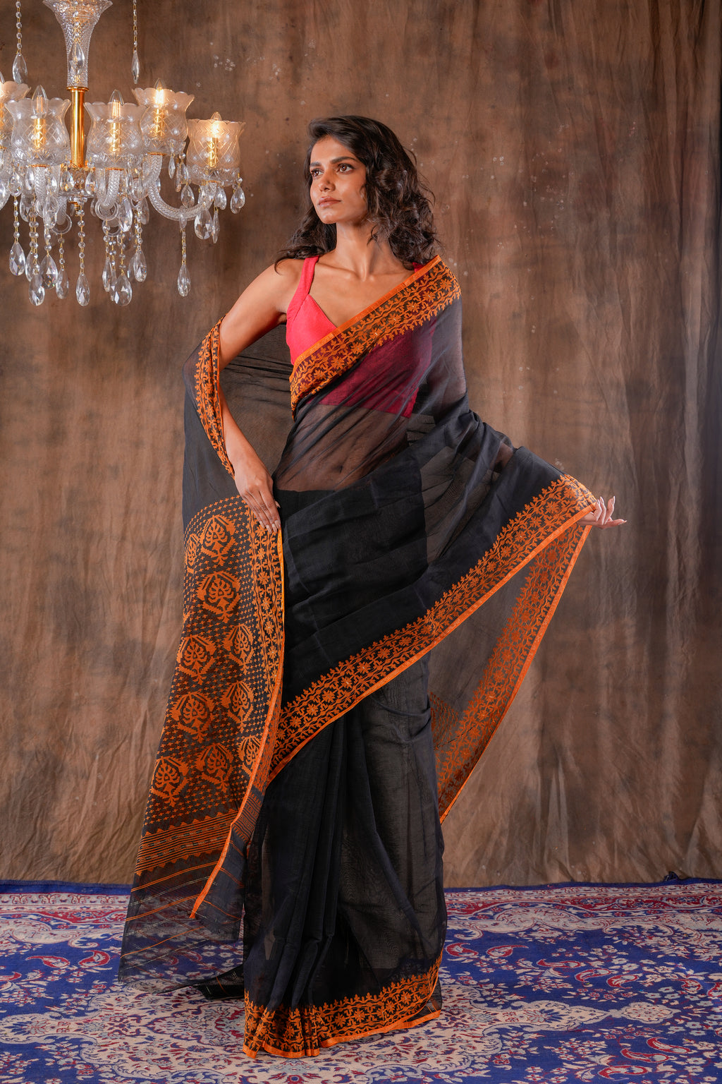 Handwoven Black Dhakai Jamdani With Orange Border Saree