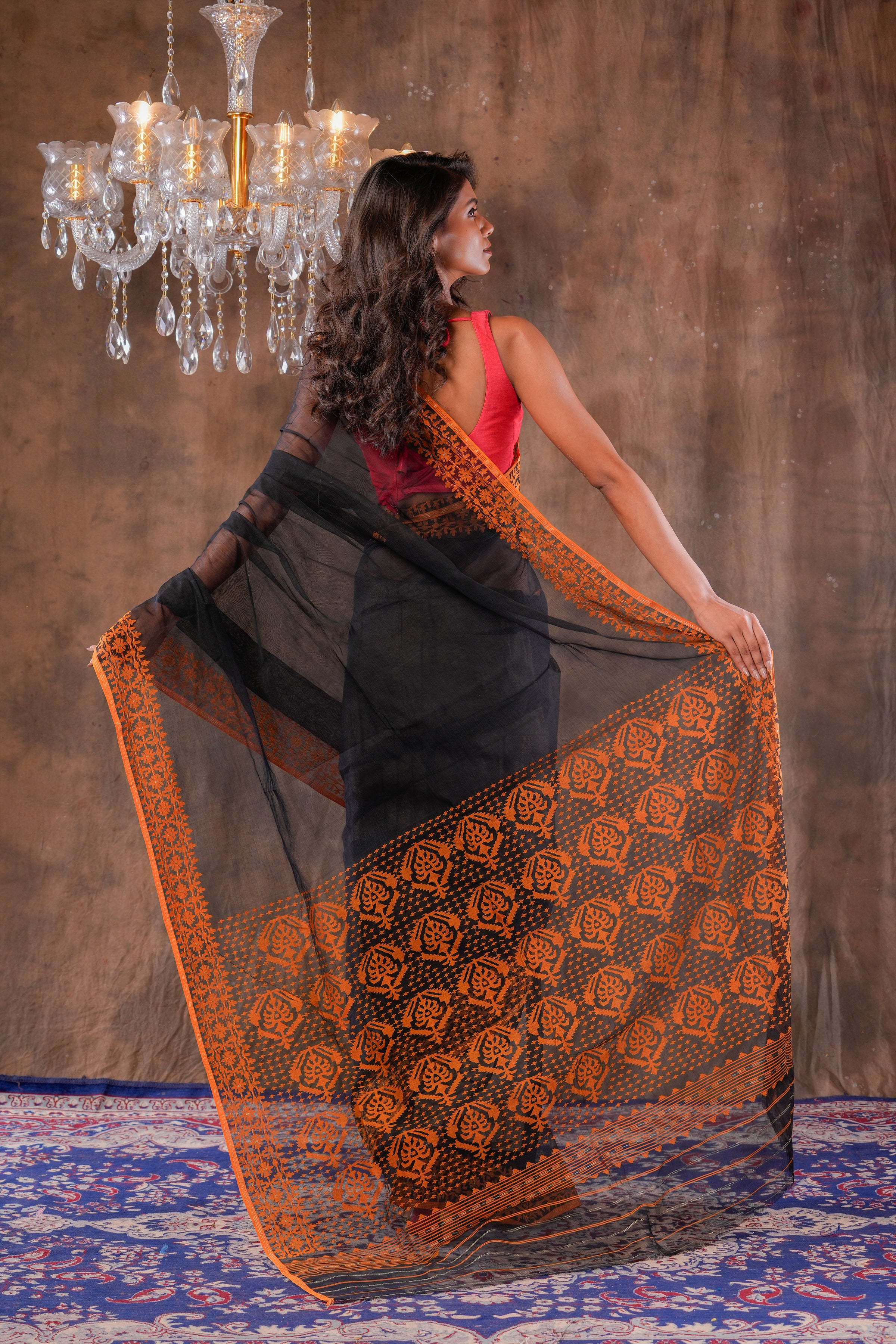 Handwoven Black Dhakai Jamdani With Orange Border Saree
