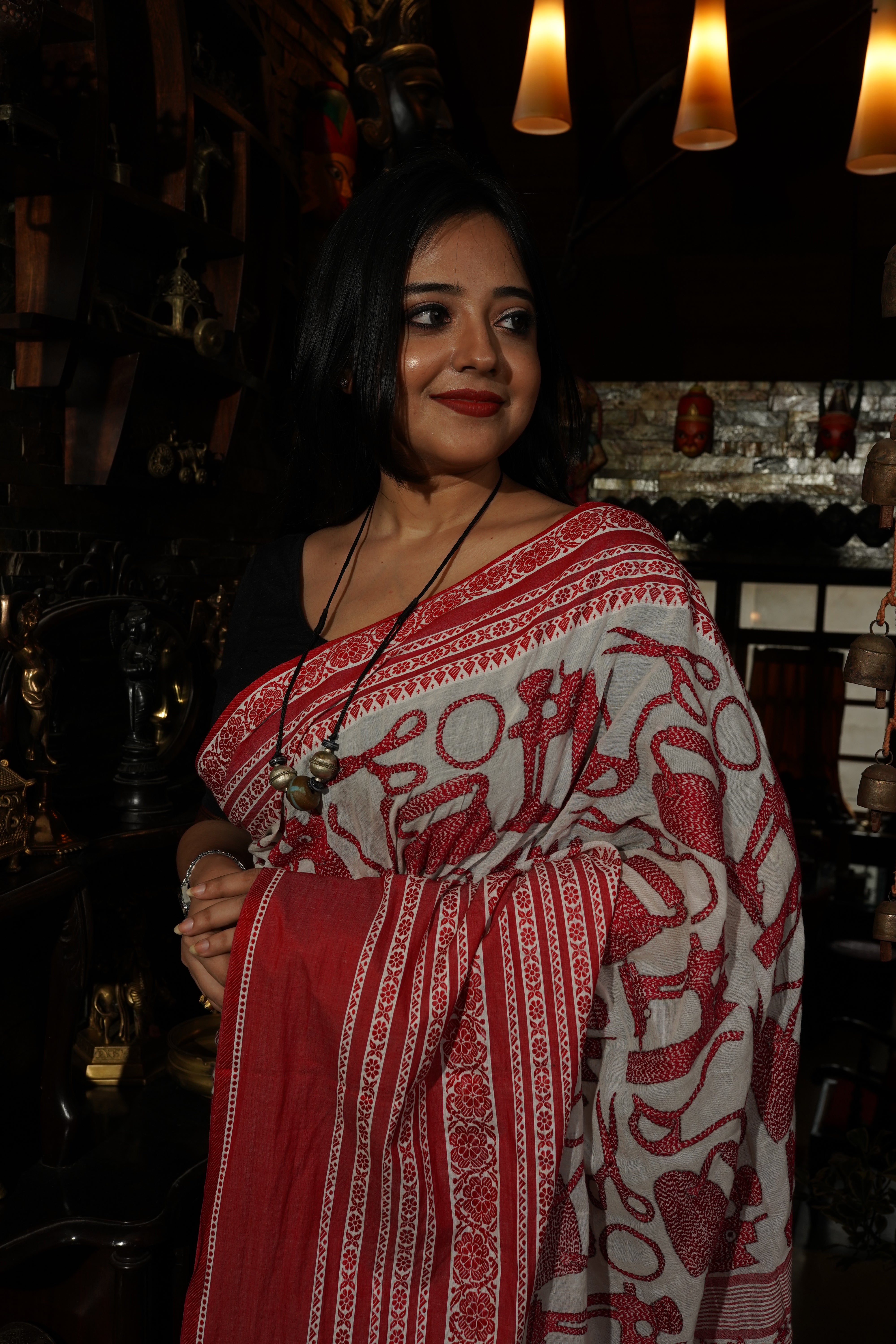 Handwoven cotton saree with red kantha work