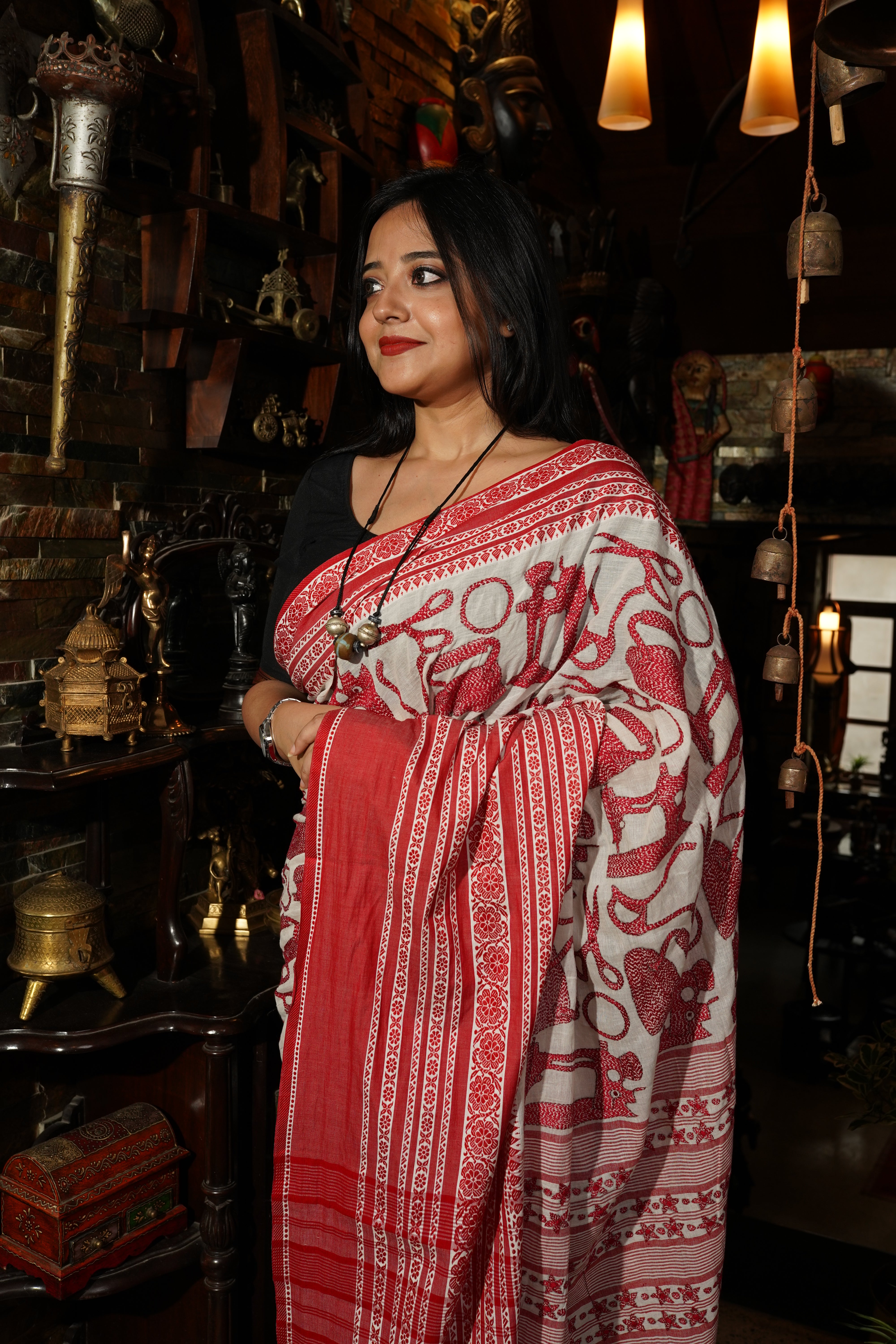 Handwoven cotton saree with red kantha work