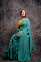 Handwoven green saree with multicolor Kantha stitch