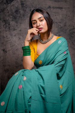 Handwoven green saree with multicolor kantha stitch