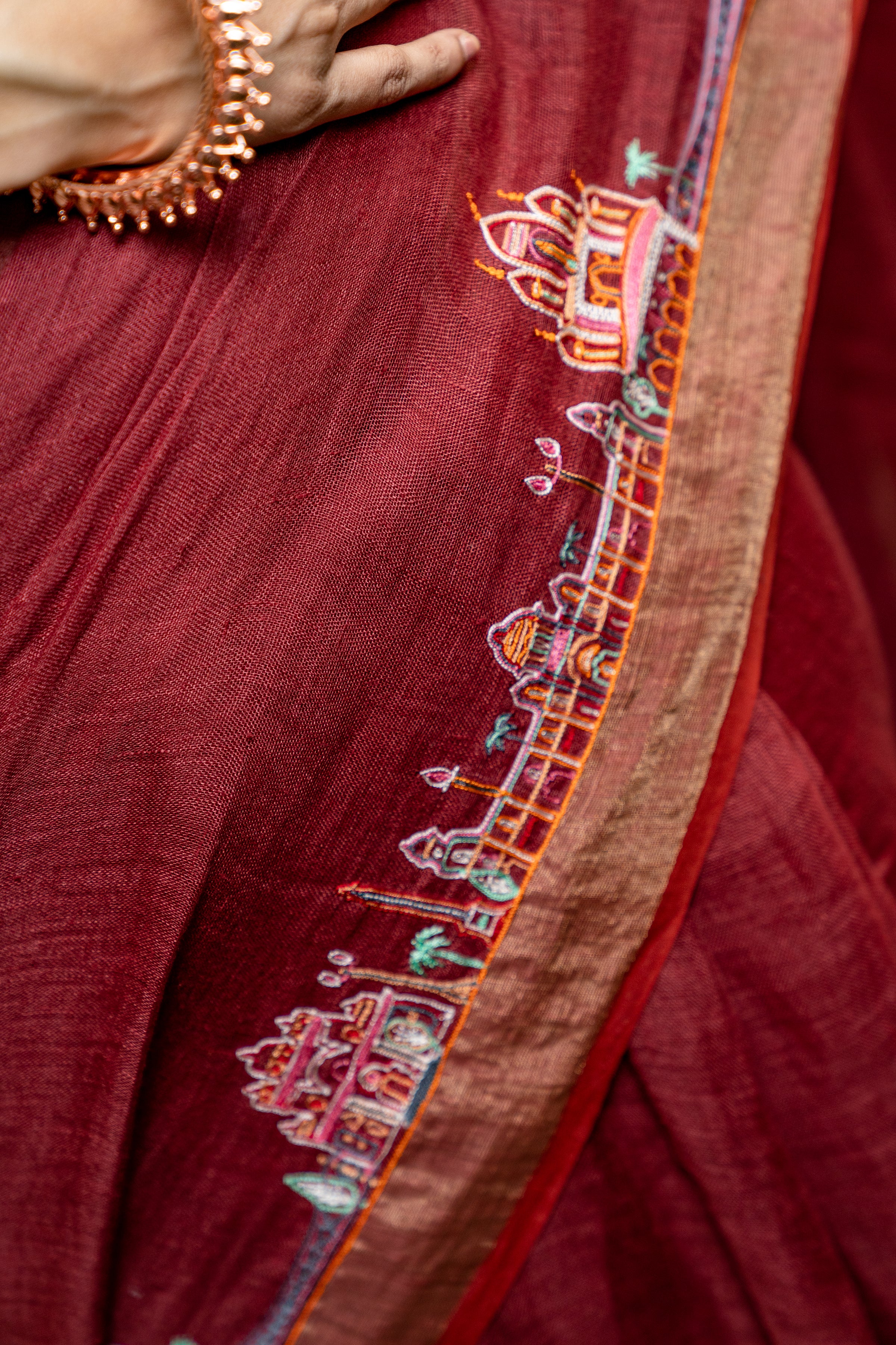 Handwoven red linen saree with kantha work