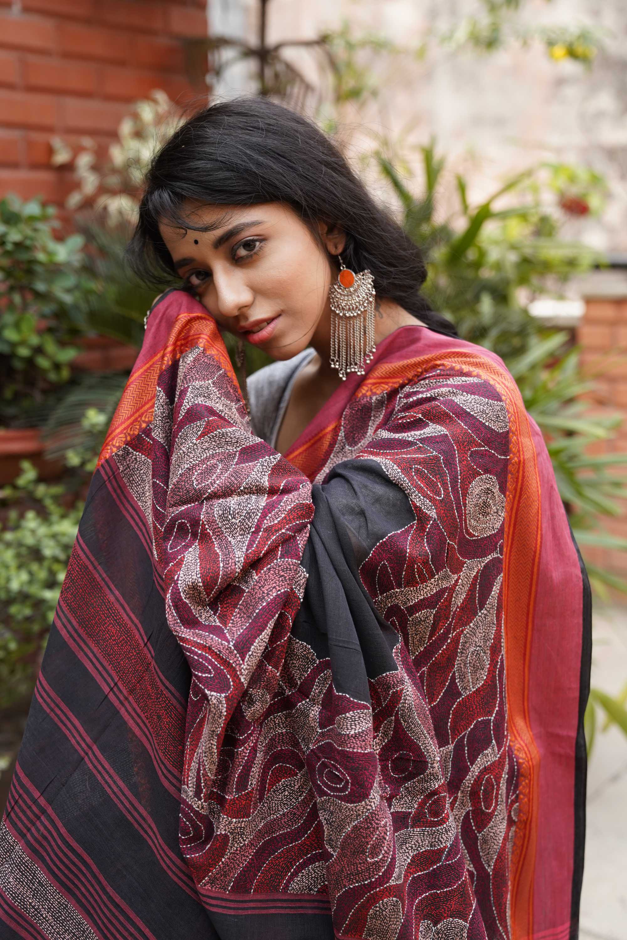 Handwoven black cotton saree with kantha work