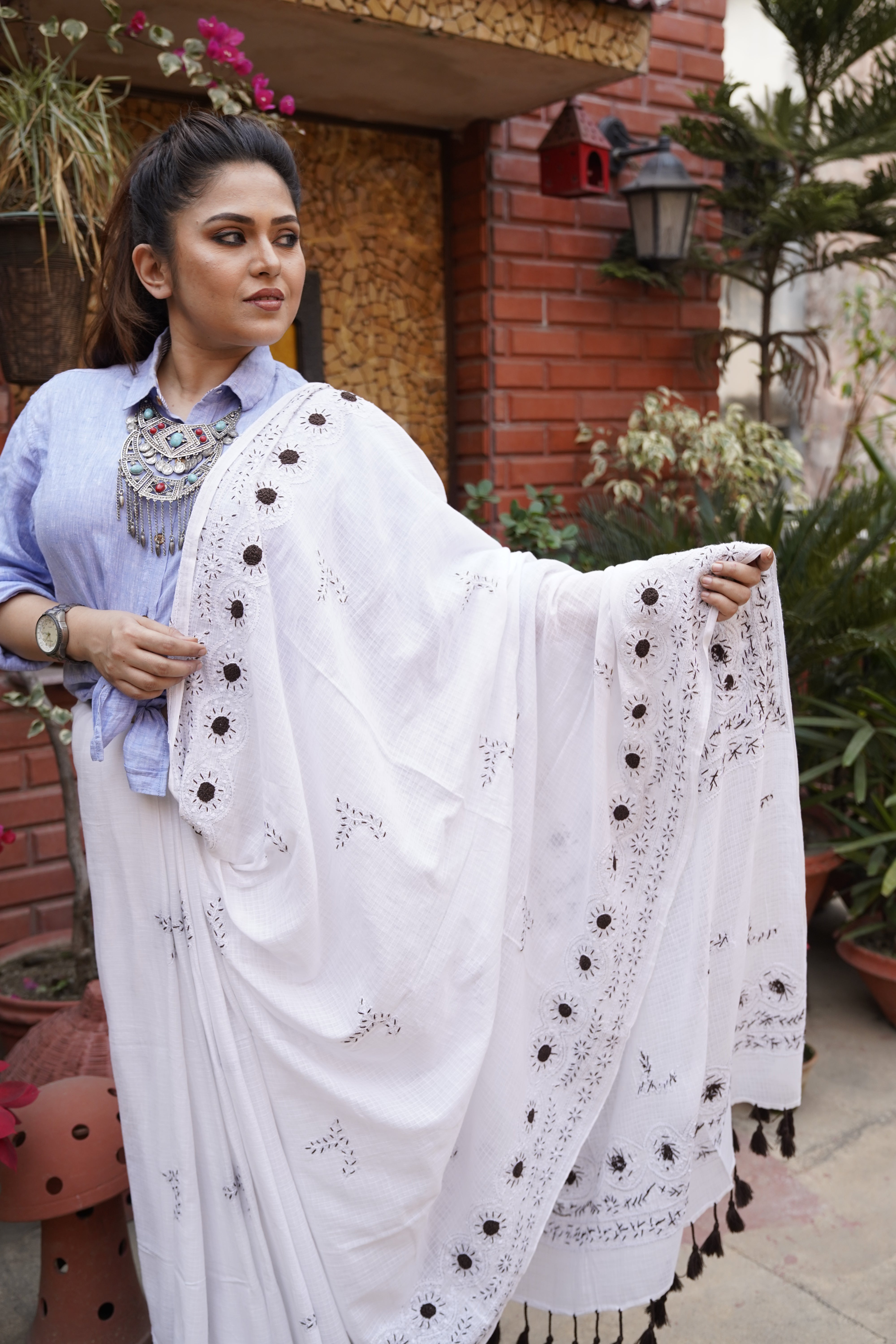 Handwoven white cotton saree with chikan work