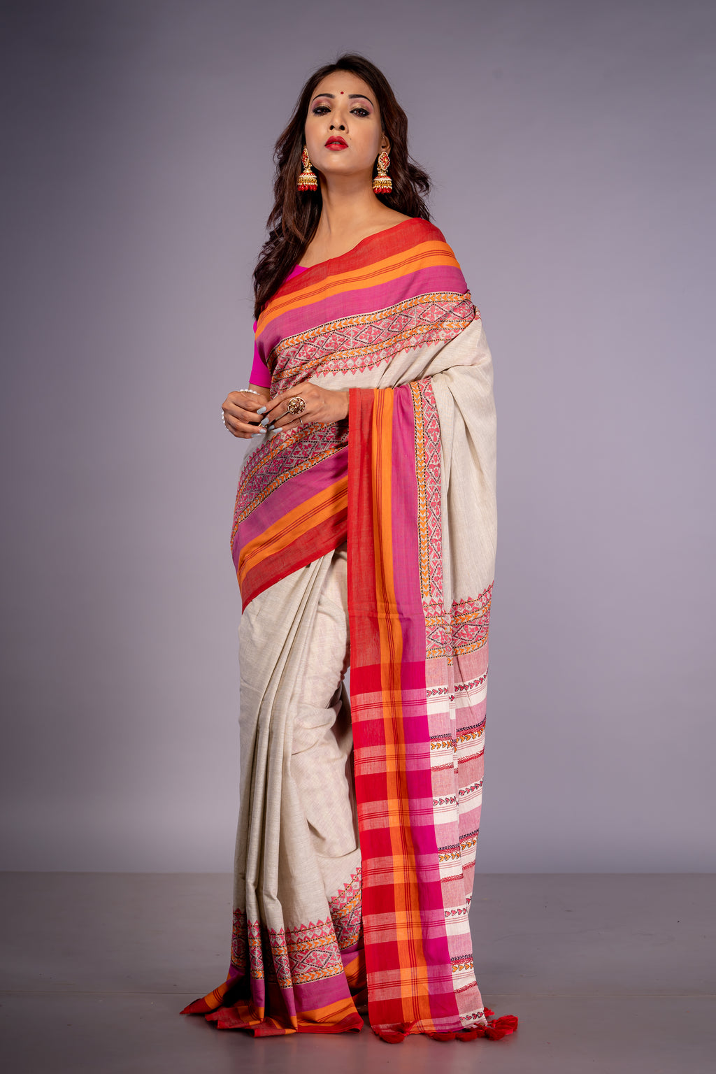 Handwoven white cotton saree with multicolor Kantha work
