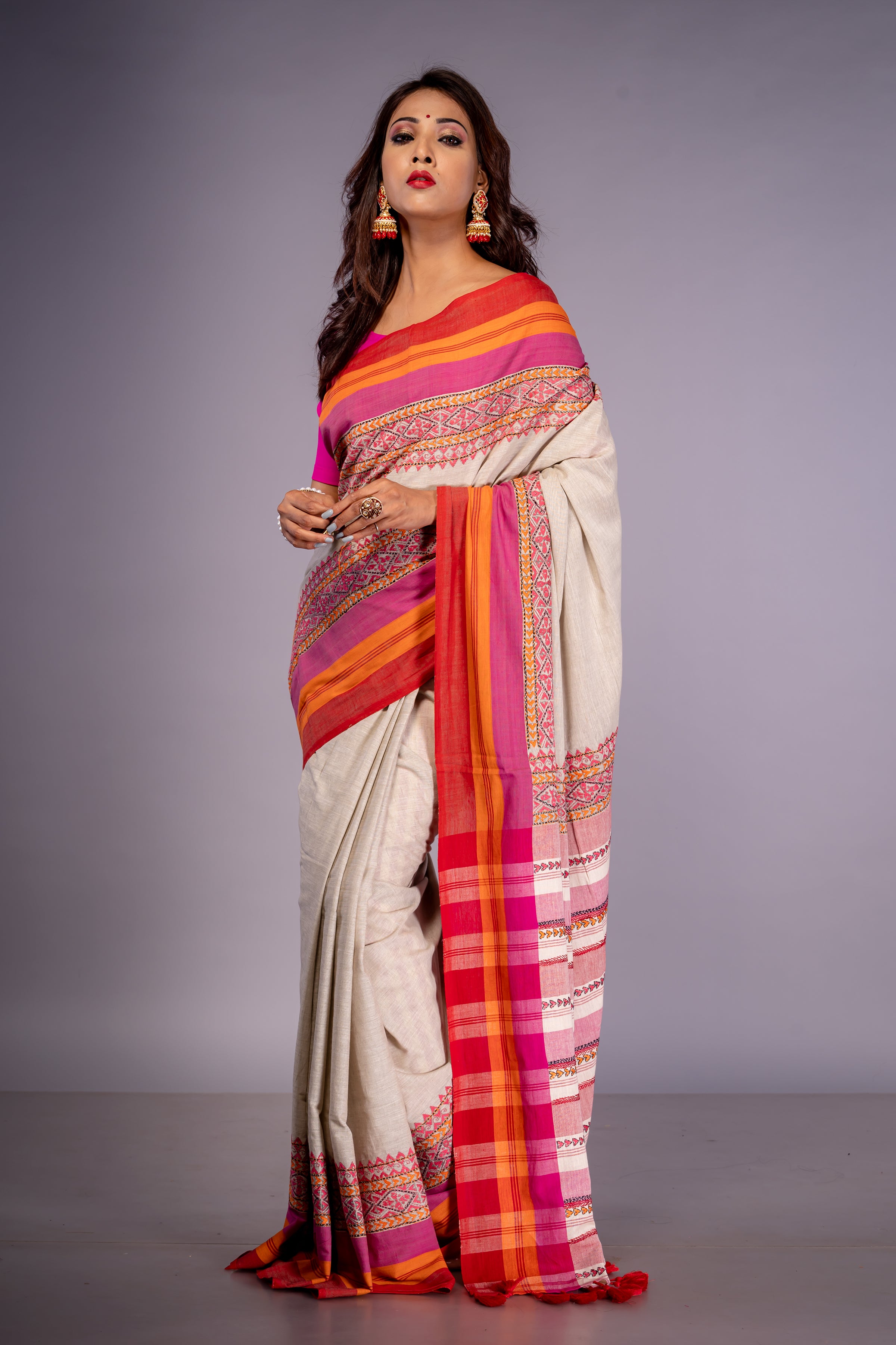 Handwoven white cotton saree with multicolor Kantha work