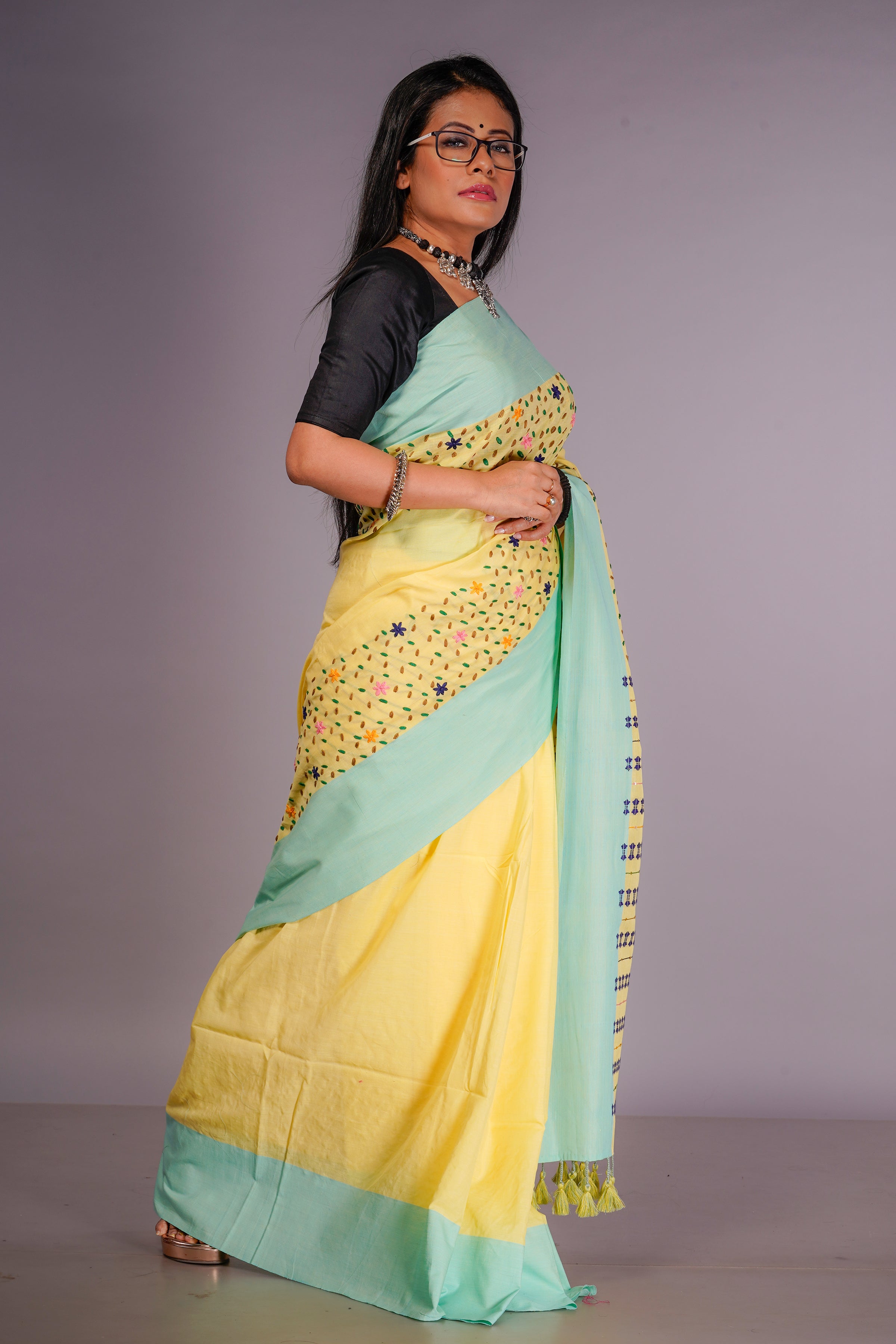 Handwoven yellow cotton saree with kantha work