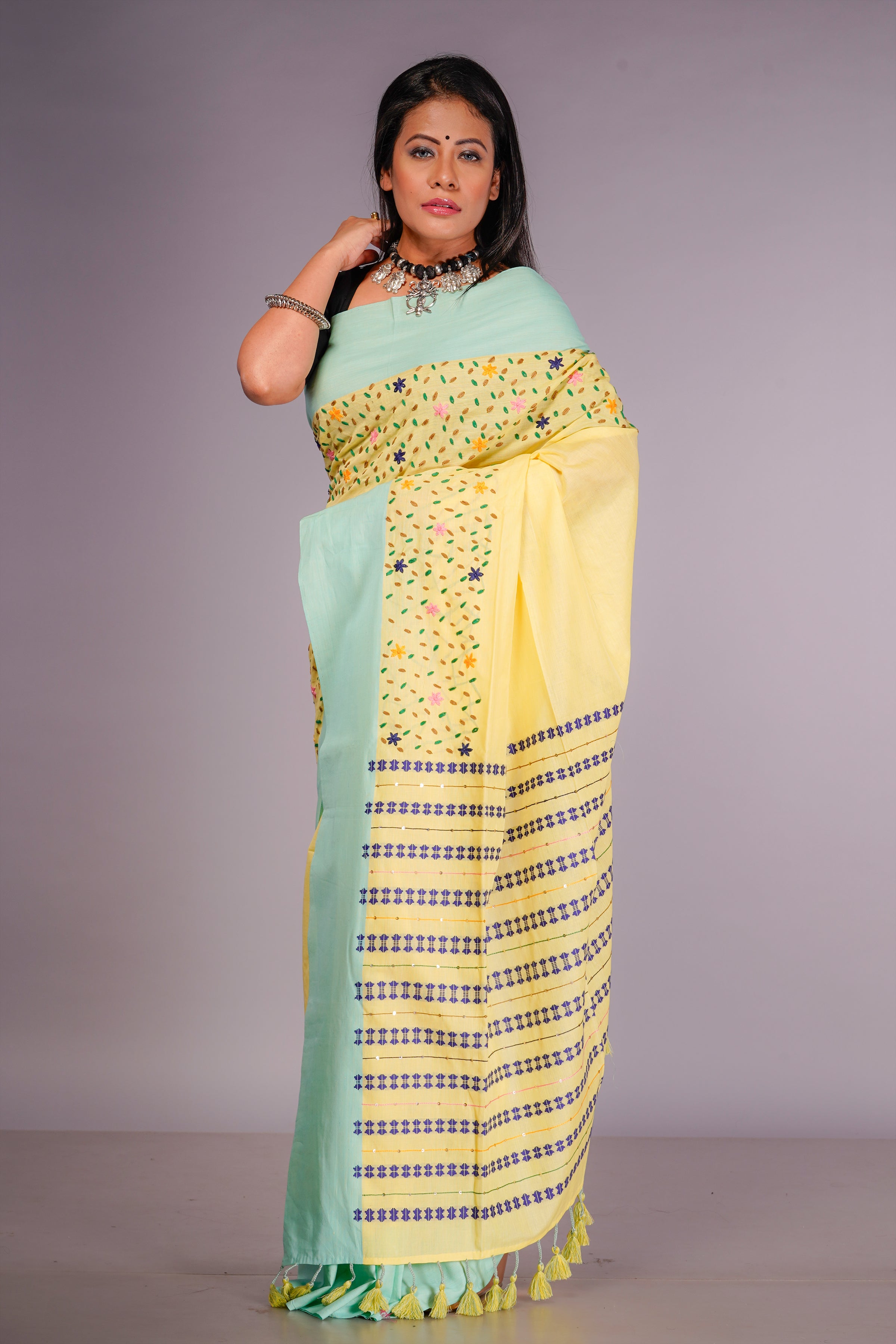 Handwoven yellow cotton saree with kantha work