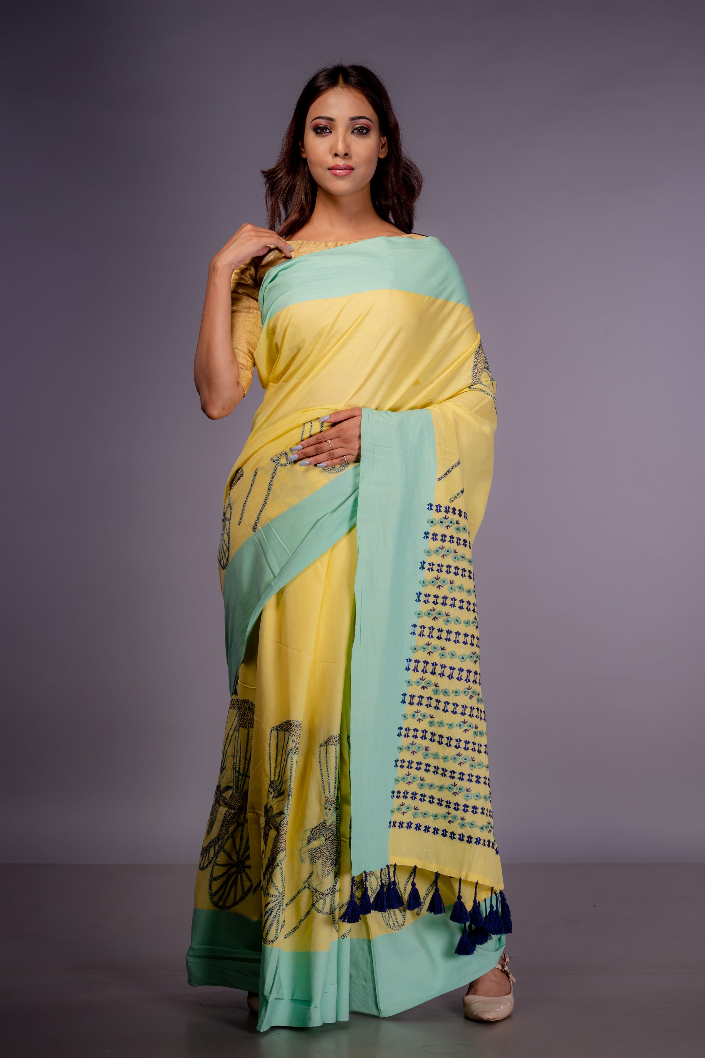 Handwoven yellow cotton saree with kantha work