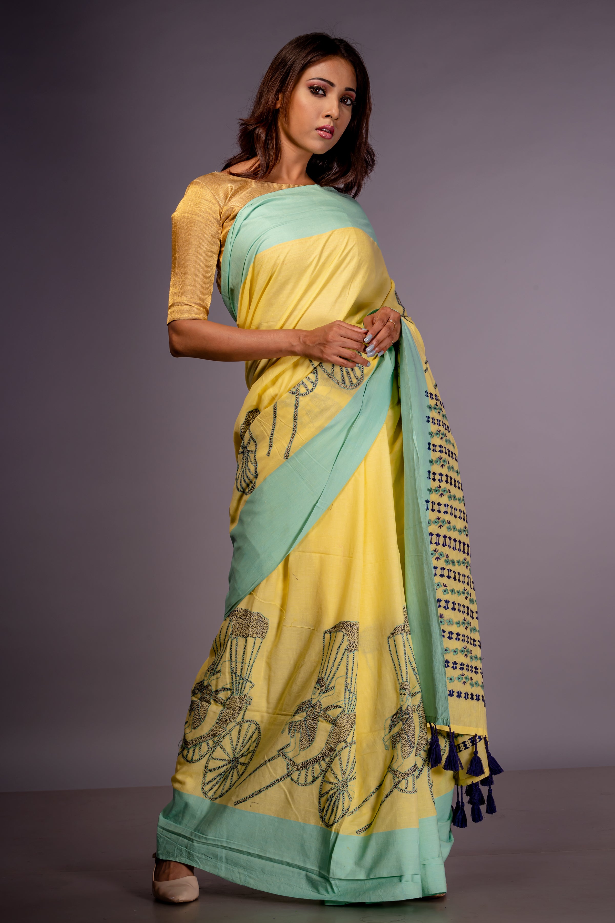 Handwoven yellow cotton saree with kantha work