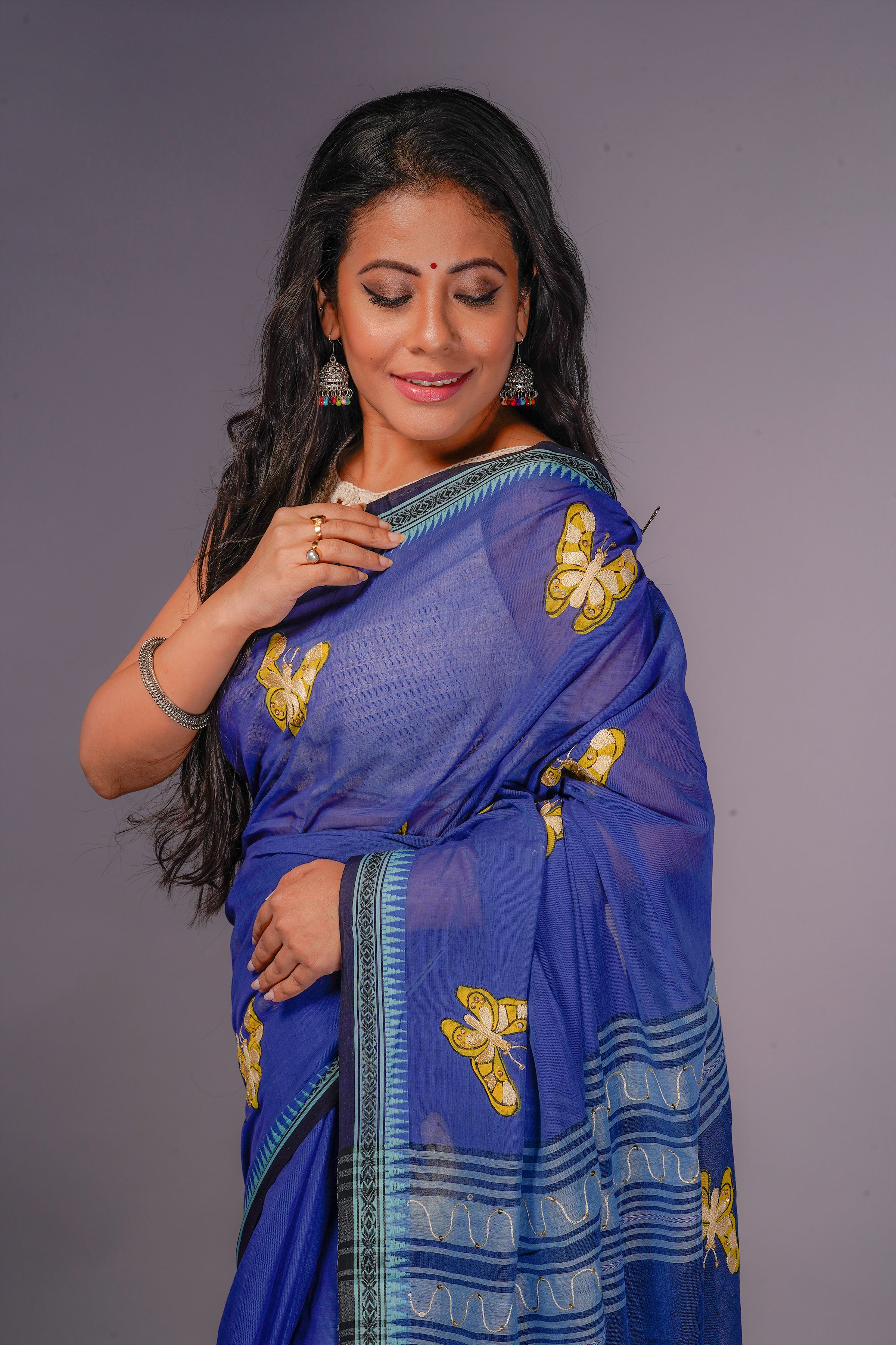 Handwoven blue cotton saree with kanta work