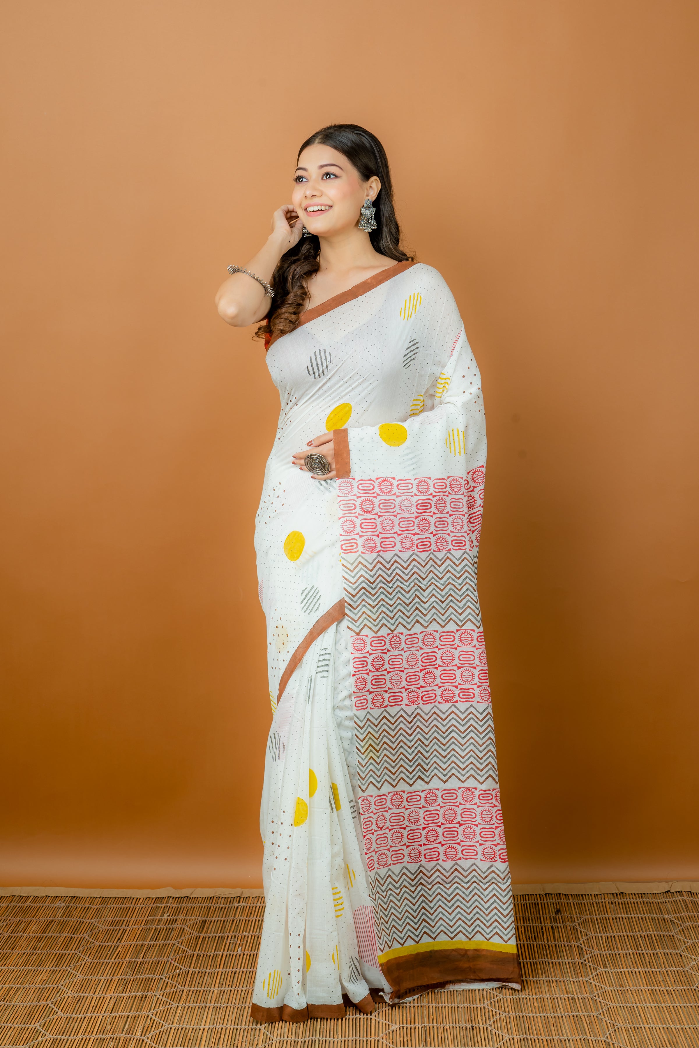 Handwoven white silk cotton saree