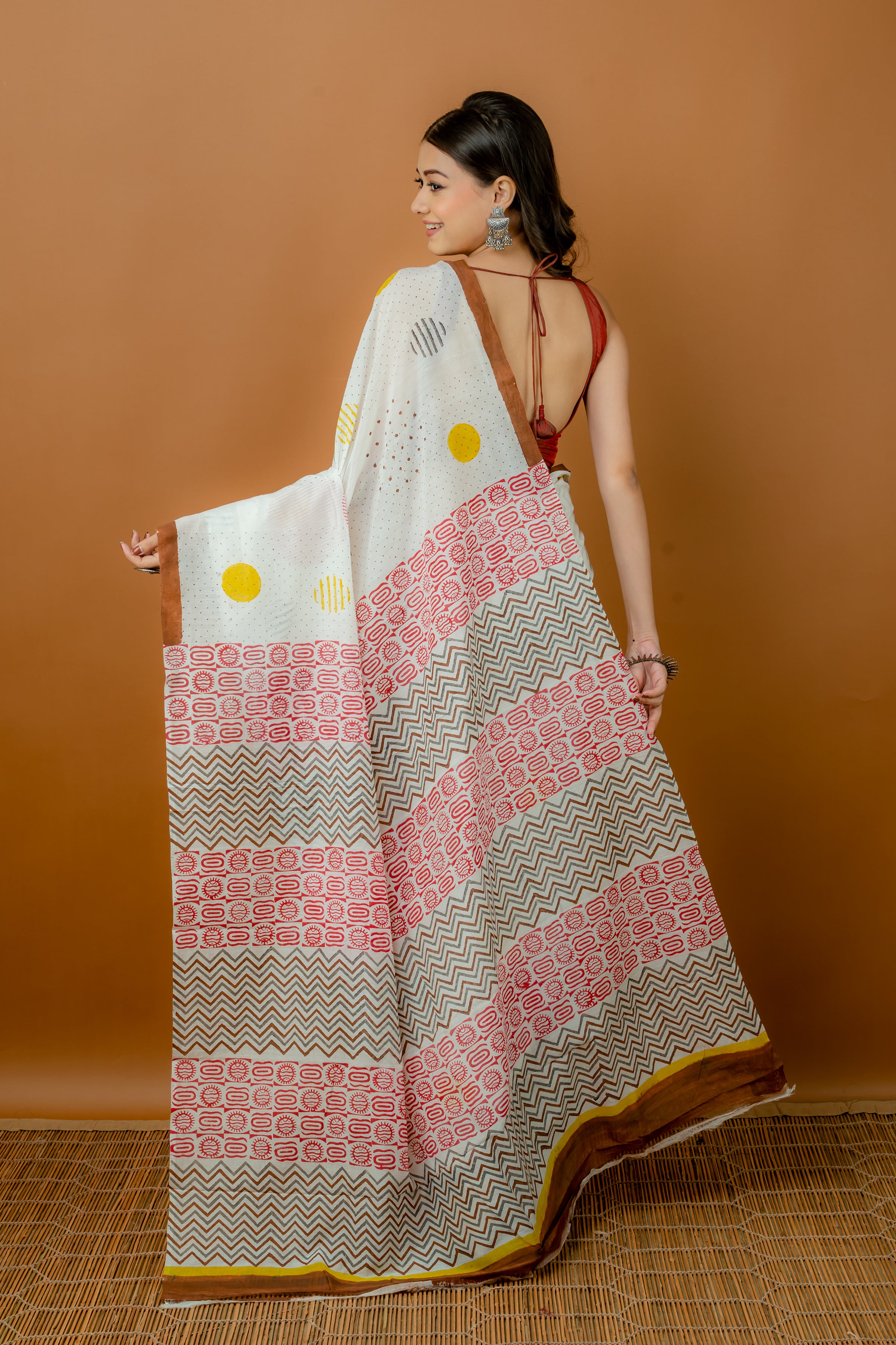 Handwoven white silk cotton saree