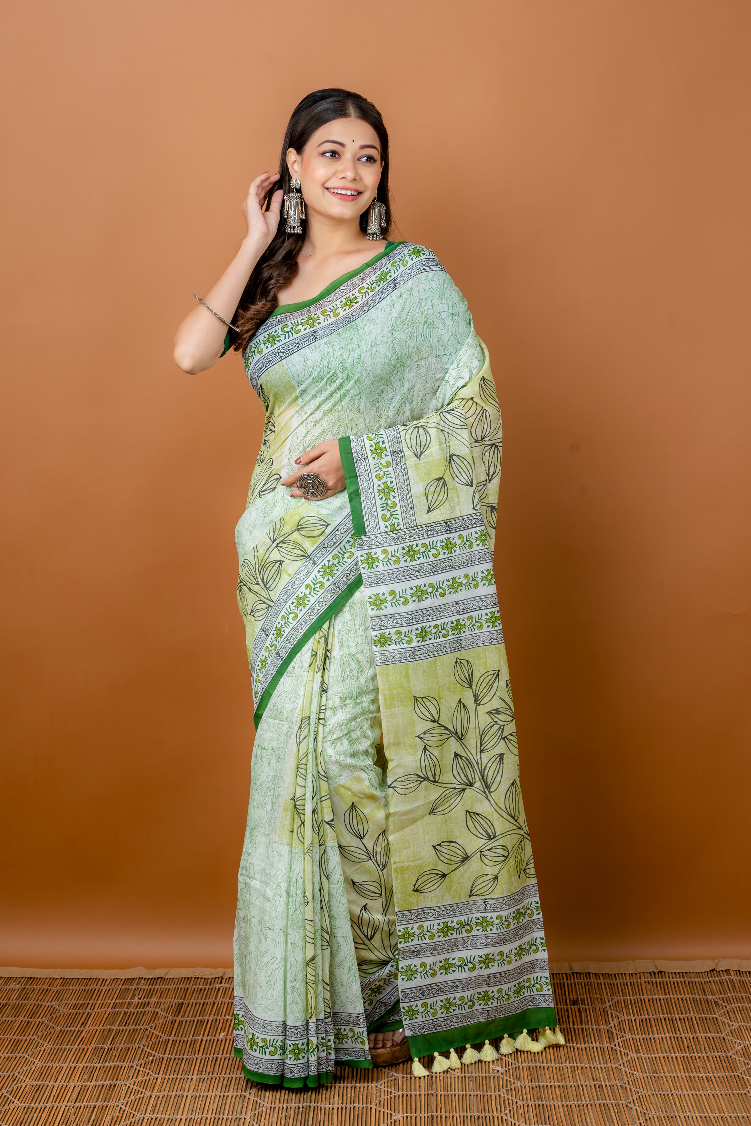 Handwoven Printed green Silk cotton Saree