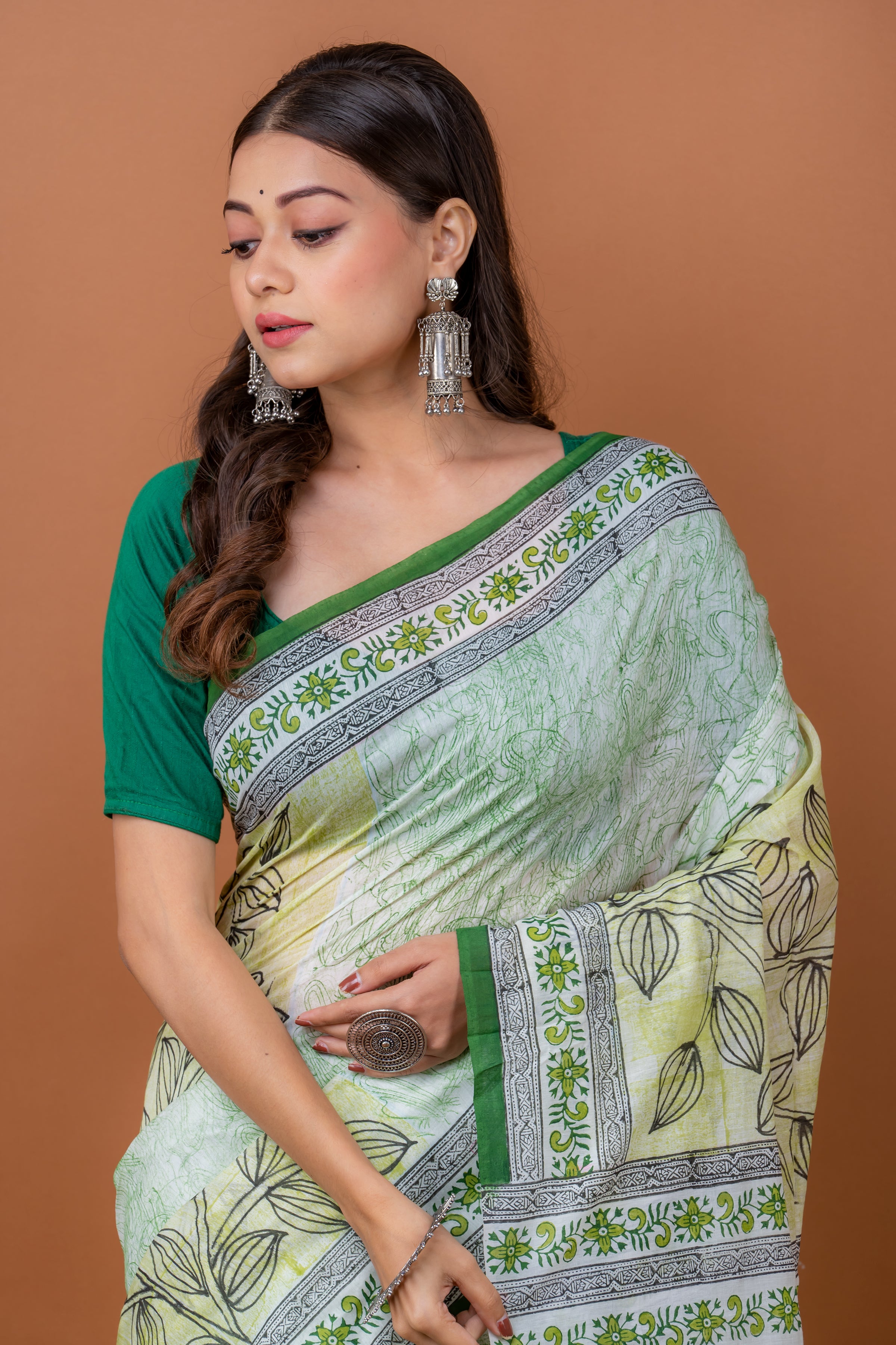 Handwoven Printed green Silk cotton Saree